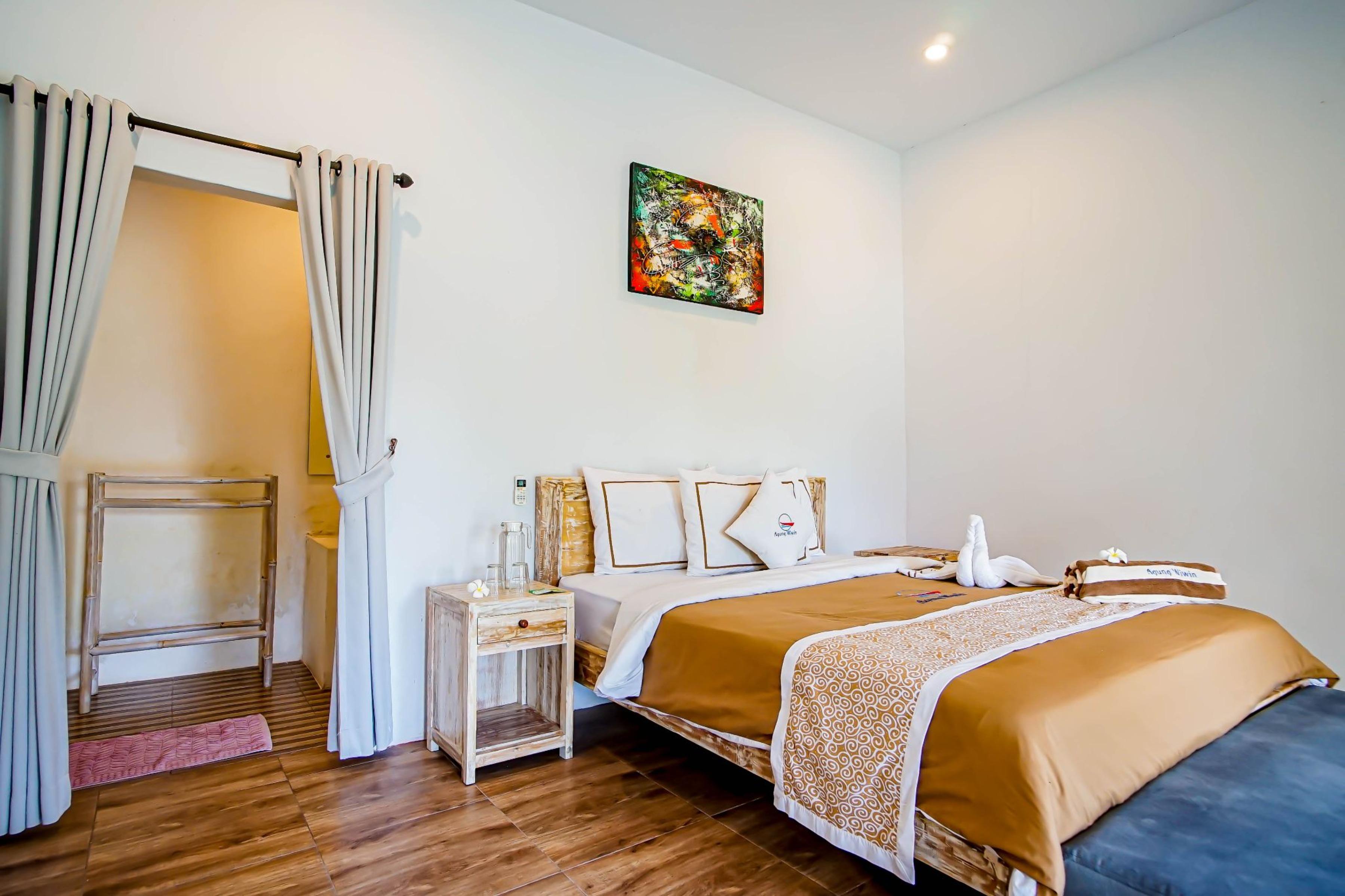 Agung Wiwin Homestay & Restaurant Mengwi Экстерьер фото