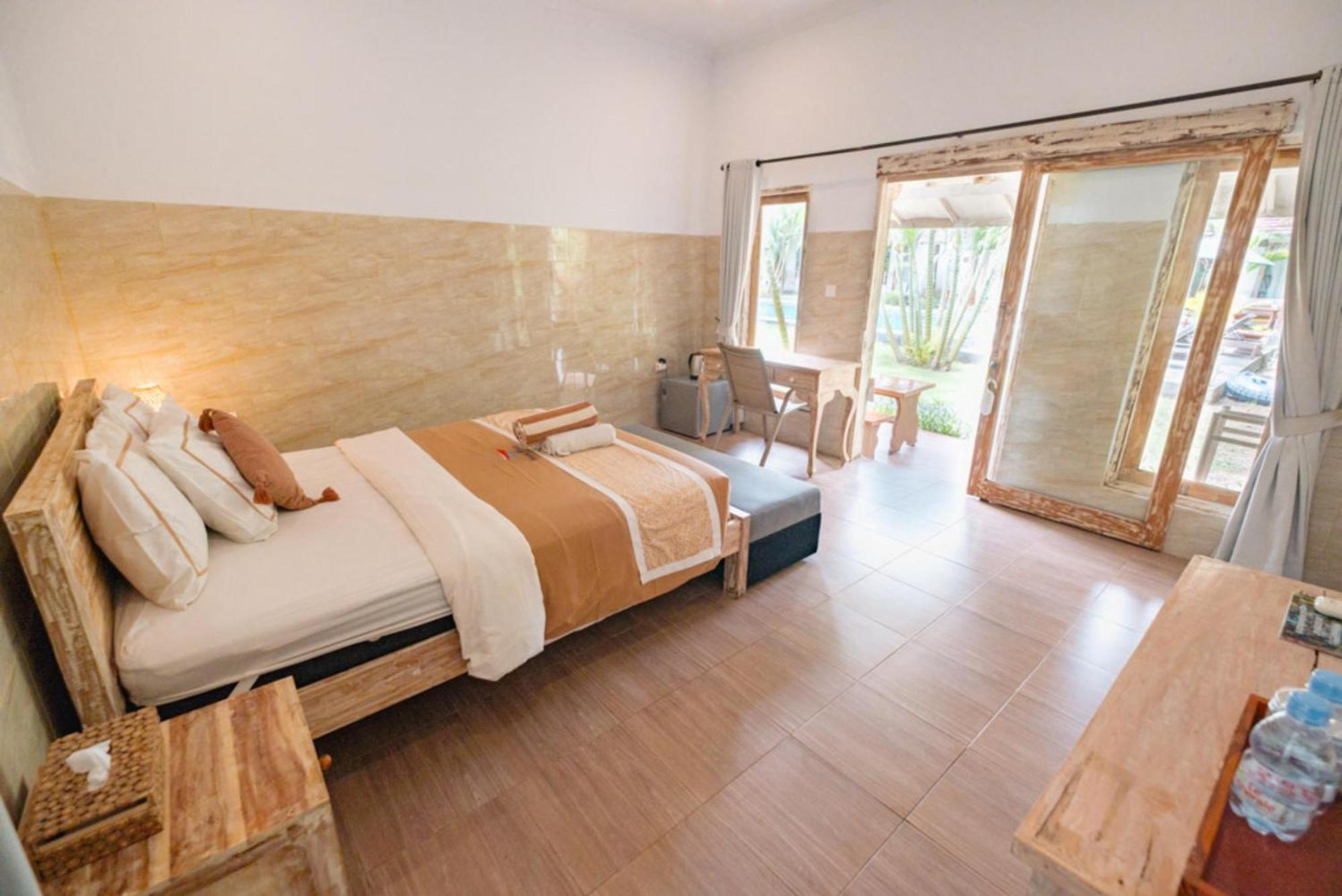 Agung Wiwin Homestay & Restaurant Mengwi Экстерьер фото