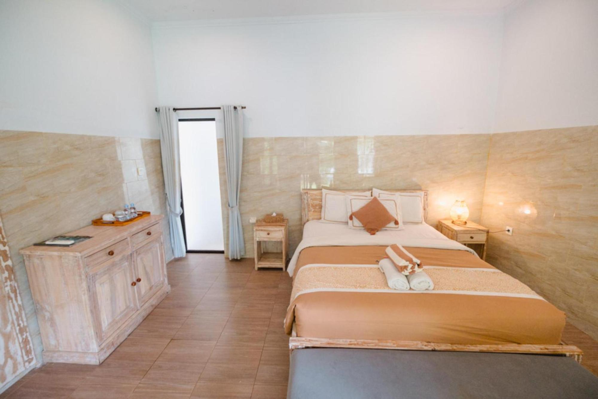 Agung Wiwin Homestay & Restaurant Mengwi Экстерьер фото